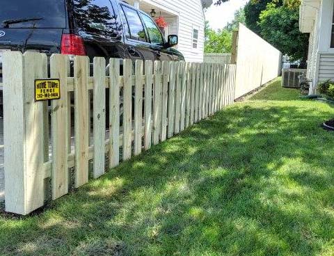 Another wooden panel fence.